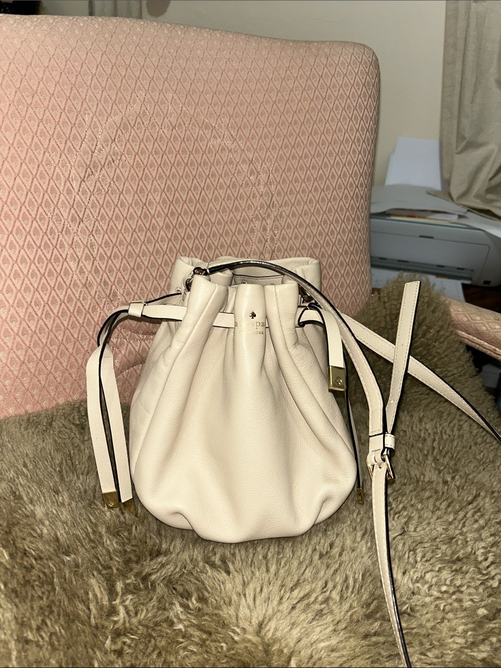 kate spade Cream Pebbled Leather Drawstring Crossbody Bag